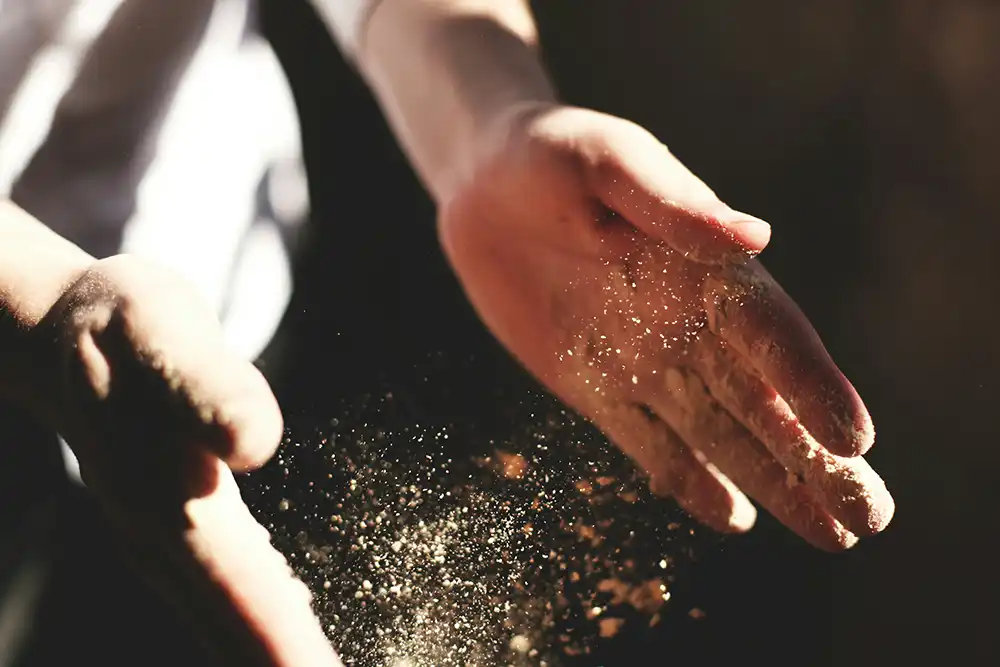 Chef with flour on hands