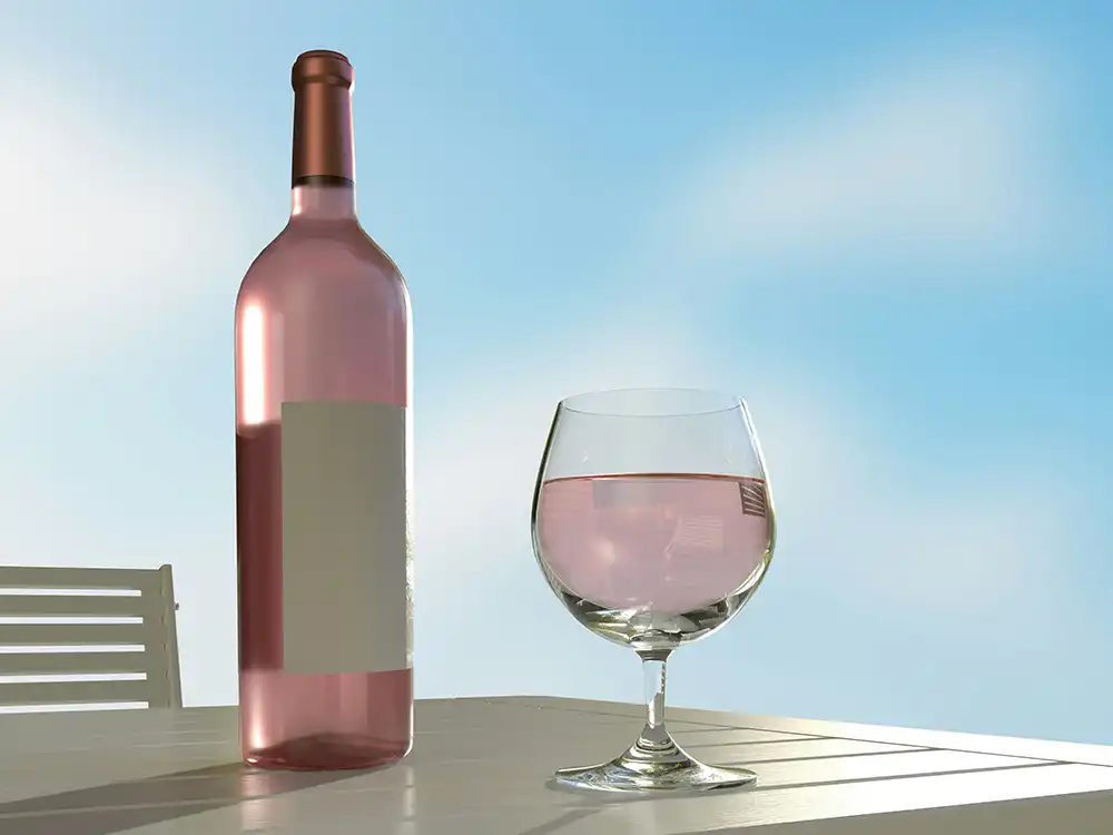 Pink wine on white table